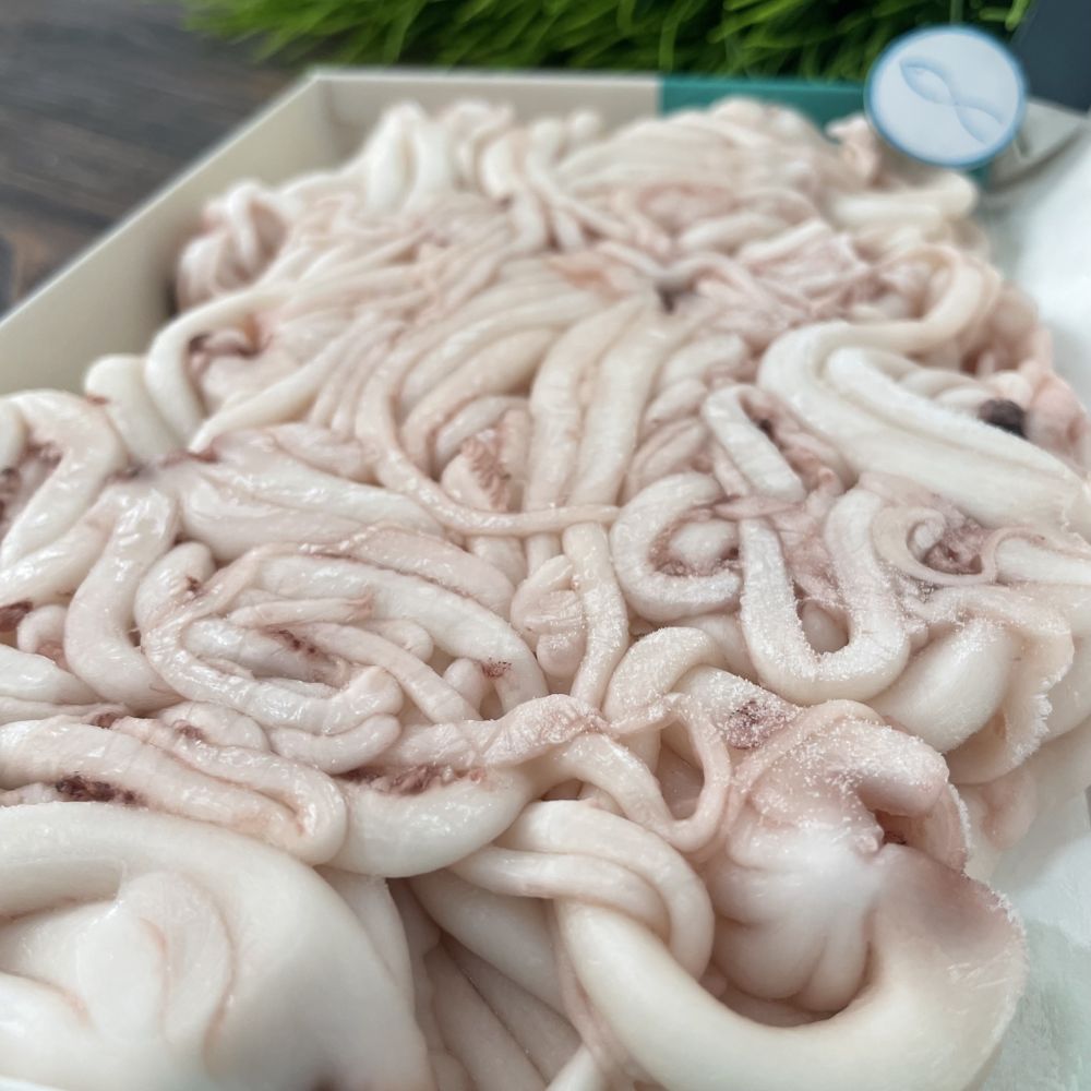 Кальмар щупальца свежемороженые